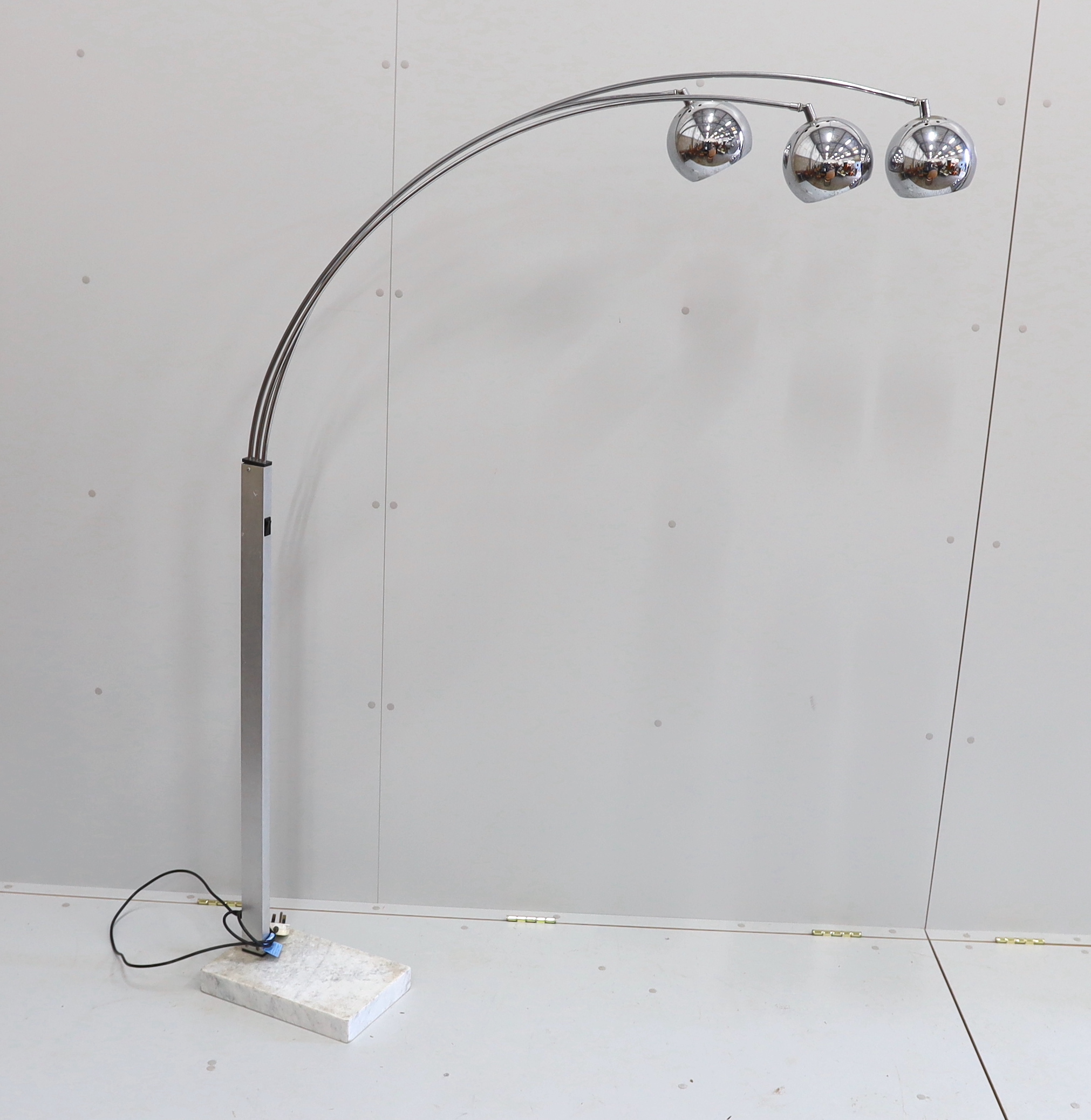 A 1960's three headed chrome arc floor light with marble base, height 180cm